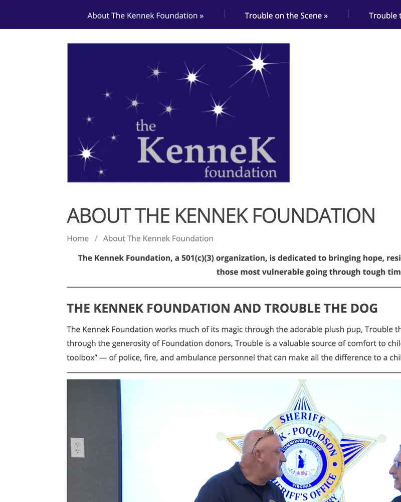 The previous Kennek Foundation homepage: a purple menu bar, a large starry logo, the heading About The Kennek Foundation in grey capitals, and a bold paragraph.